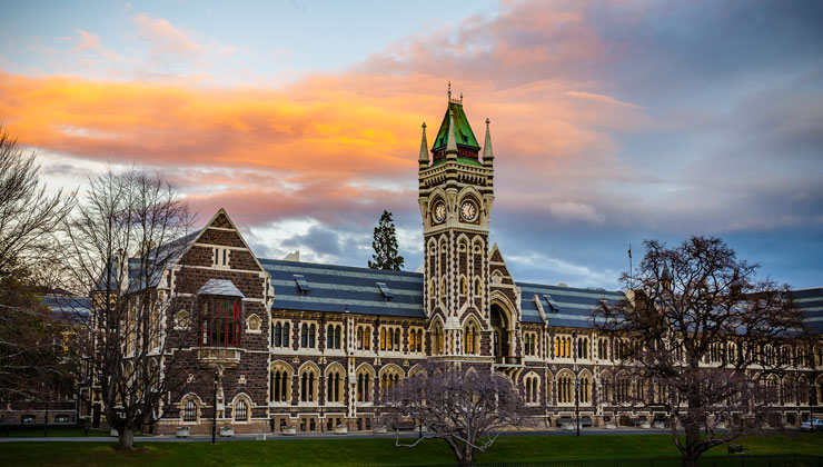 Campus build with an orange sunset at the University of Otago in Dunedin, New Zealand. 