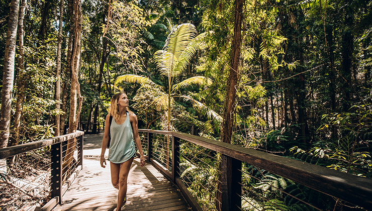 Student explores the lush green area of Fraser Island in Australia.
