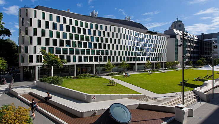 Faculty of Science building with white facade at the Alumni Green, UTS.