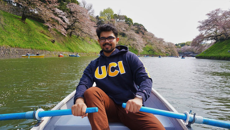 UC Irvine student rows a boat down the Chidoriagafuchi Moat in Tokyo, Japan.