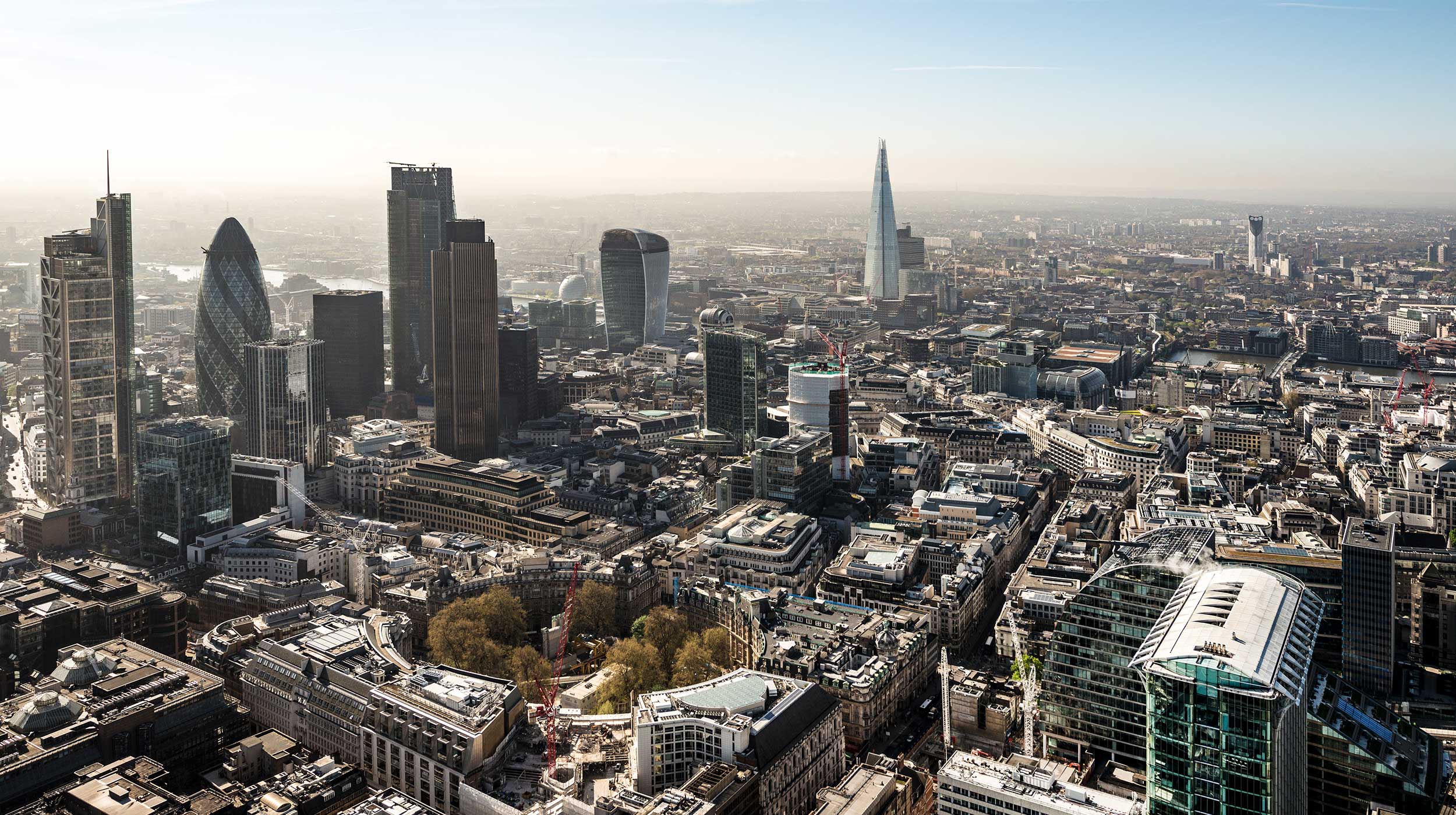 Aerial over London, Financial District and River Thames