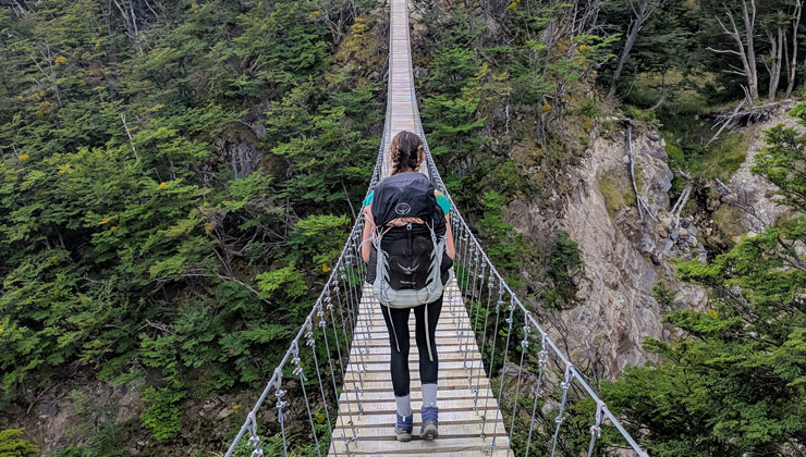 UC Berkeley student Hannah Phalen crosses a narrow bridge at Torres del Paine, Chile.