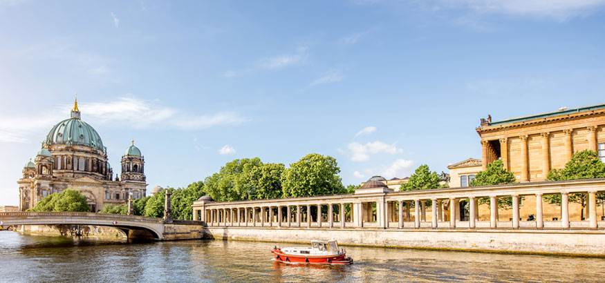 Sunrise lights up the National Gallery building in Berlin, Germany.