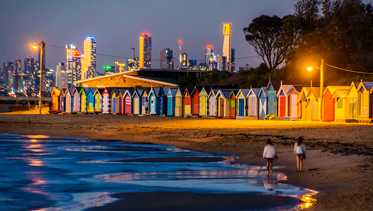 Colorful beach huts near Brighton Beach at dusk in Melbourne, Australia. 