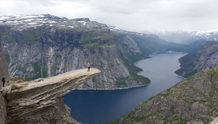 Nolan Pieper of UC Santa Barbara stands on the Trolltunga, a rock formation that juts out from the mountain, in Oslo, Norway.