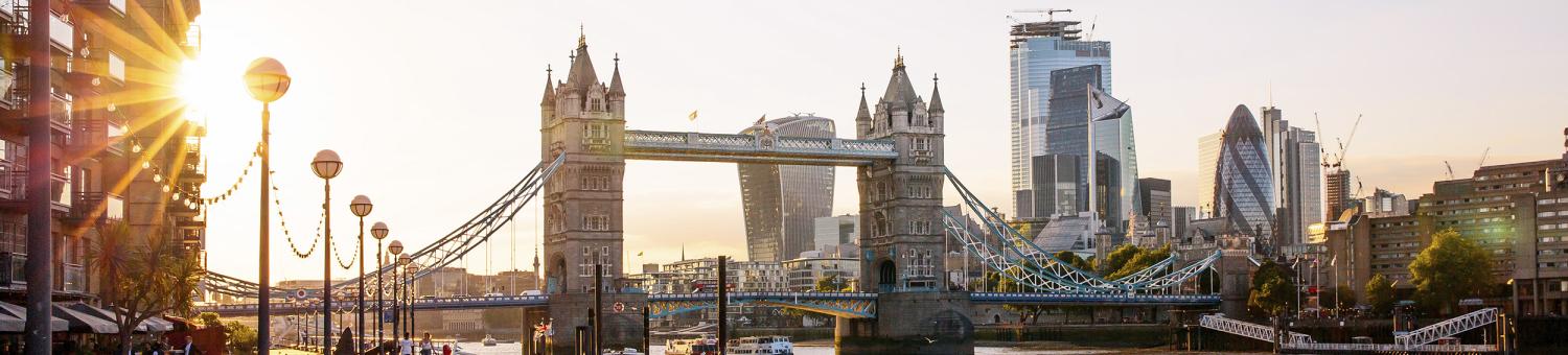 London skyline with Tower Bridge and skyscrapers of London at sunset