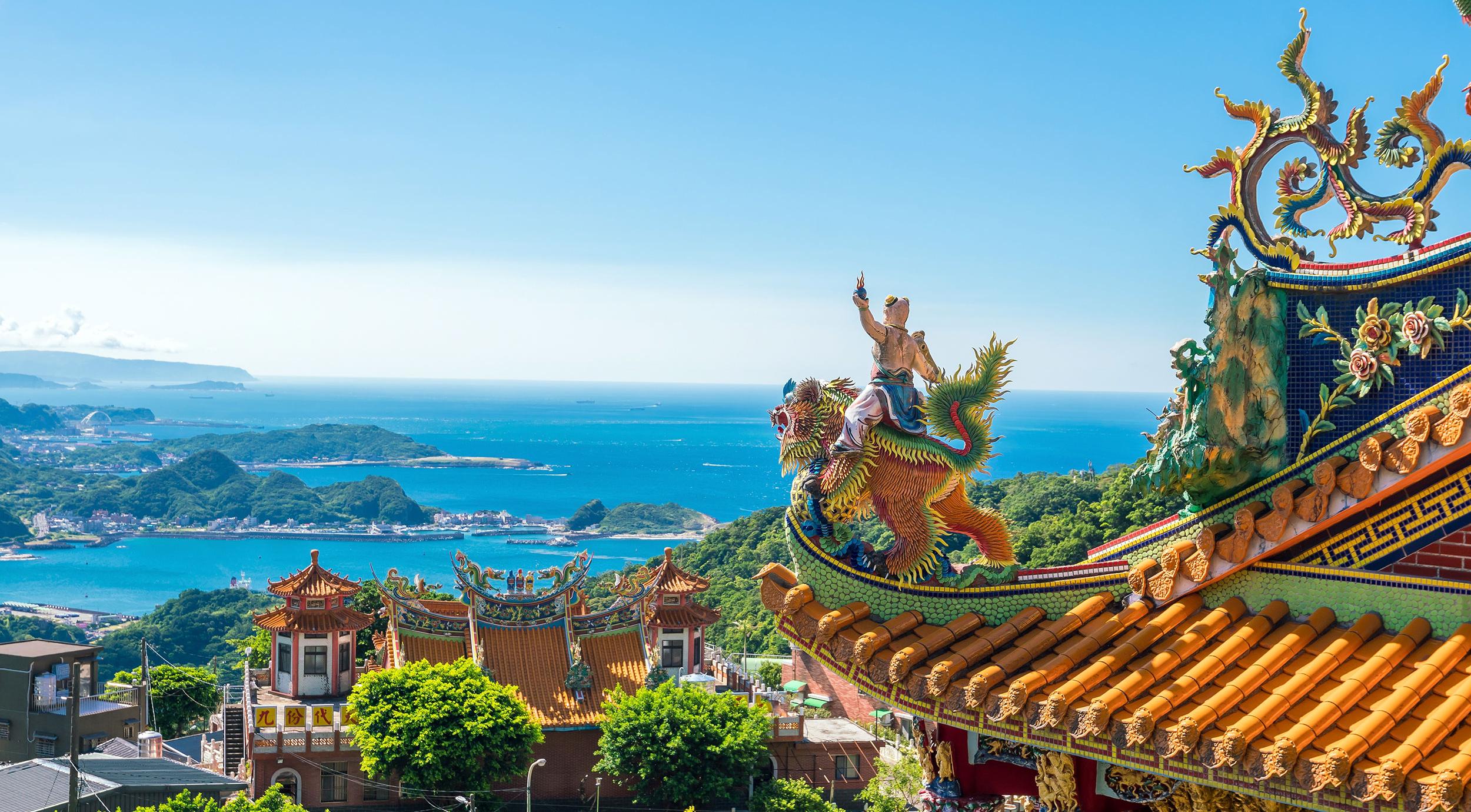 Beautiful photo overlooking buildings in Taiwan toward the sea.