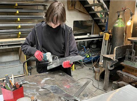 Isabella Damberger-Sheldon working at art internship in Paris