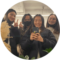 Brea Spencer and friends take a selfie together in a mirror. 