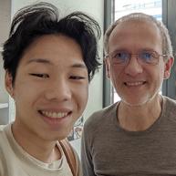 Jerry Cheung takes a selfie with program director, Christophe Ritzenthaler. 