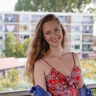 Student smiles for a photo in the Netherlands. 