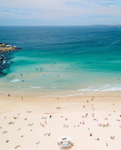 <p>Swim and surf at iconic Bondi Beach.</p>