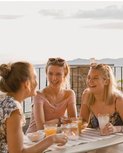<p>Rooftop sunset with traditional Bolognese refreshments in the fall</p>
